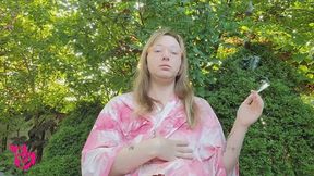 Smoking Slims in the Garden in Pink Bathrobe and coughing