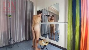 Naked nudist hairdresser. Stylist cuts her own hair. Regina Noir 205
