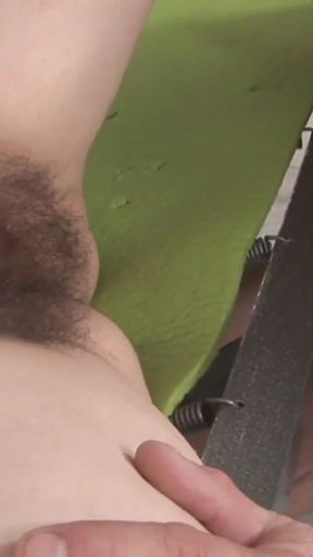 The brunette with natural tits and a hairy pussy shaves before having a fuck