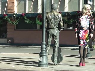 Mrs Samantha 'standing on the corner in Winslow Arizona' and driving her red Mustang Convertible