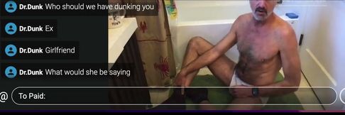 Guy Getting Dunked in a Tub.