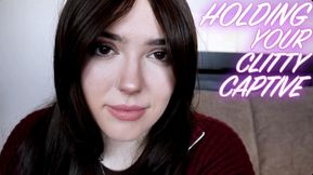 HOLDING YOUR CLITTY CAPTIVE