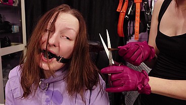Slave girl hair cutting