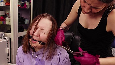 Slave girl hair cutting