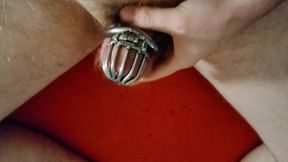 Redhead faggot jerks off desperately in chastity cage