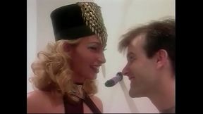 Smart blonde lady Sophie Evans and her admirer discuss the flawless technique of modern artist working in style of neo-futurism