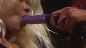 Redhead domina disciplines lesbian sub with mega dildo