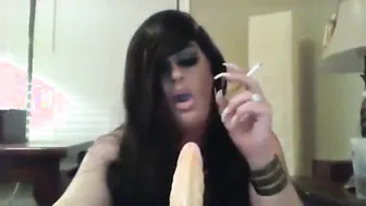 Crossdresser Smokes and Sucks a Dildo on Webcam