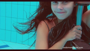 Brunette tight babe in the pool
