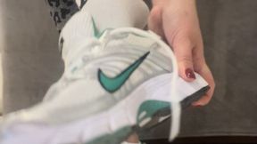 Nike sneakers removal and white socks and feet