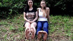 Two pairs of summer young soles of college girls in a public park (Part 1 of 6)