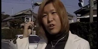 Brunette gives a busty outdoor blowjob during an interview
