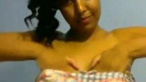 Playful webcam chick with nice tits is happy to wank a fake cock