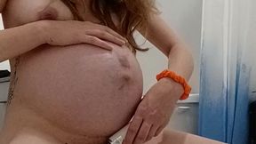Pregnant MILF gets a wet and noisy vibrator ride