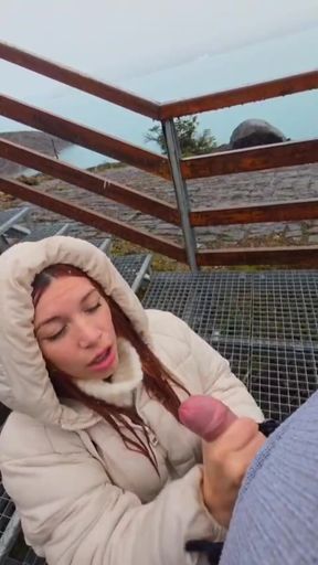 Slutty redhead gives a nice blowjob to an older guy outdoor and takes his cum in her mouth