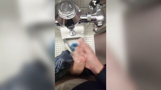 Uncircumcised nubile wanks off in public douche urinal before solo wordy jizz shot with bellowing
