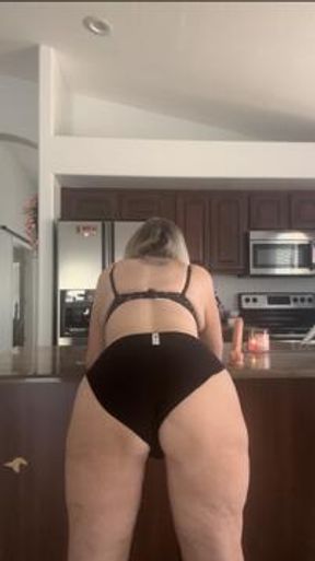 Mommy Serves It up In Kitchen