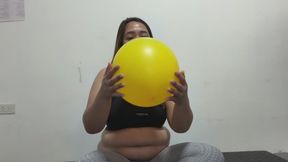 Giant yellow balloon inflating until it POPS!