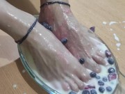 Amputee man fills his beautiful and skillful feet with cream, strawberry and blueberries for you