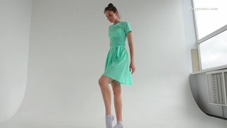 Dressed flexible brunette Alla Sinichka