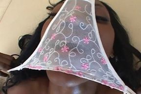 Ebony babe gags on a huge cock while she rides another to a cumshot