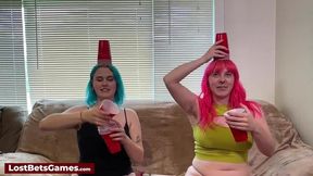 Bea & Lizzy are a lesbian couple playing a naughty strip game