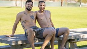 Well-muscled hotties start flirting in the park