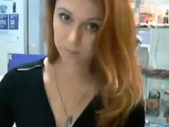 Pretty Redhead Fooling Around At Work