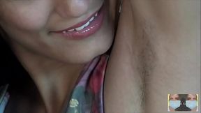 Licks her Armpit