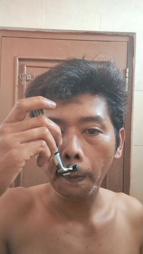 Exotic Skinned Asian Adult Man Shaving