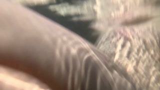 Naked girl swims in the sea and masturbate underwater