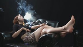 Sensual Smoking Performer Lounging Barefoot on Leather Couch Exhaling Smoke — TIAN2 4K