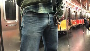 Very masculine worker on the subway