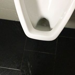 Pissing over the toilet at work