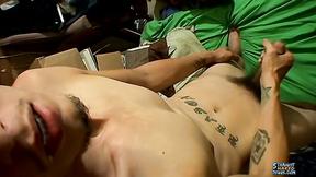 ”Inked twink Bentley pumps his dick with his eyes closed”