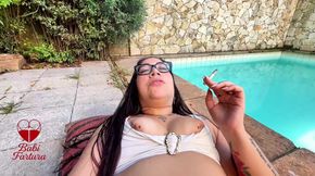 Relaxing, Smoking, and Playing a Tune by the Pool with the Construction Workers Watching From the Side.