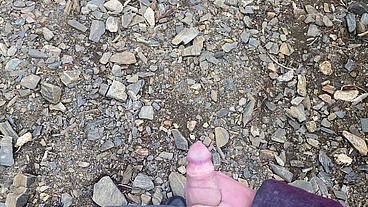 I jerk off a flaccid dick and cum on a mountain lake in nature! POV!