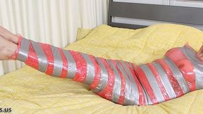 Tall Buxom Blonde Ashley Rose Is Fully Wrapped In Red Plastic And Silver Duct Tape!