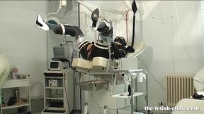 Cruel Nurse humiliates femdom slave with rubber doll and high heels