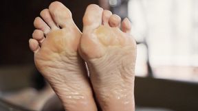 Girl washing calloused feet in the bathroom (720p)