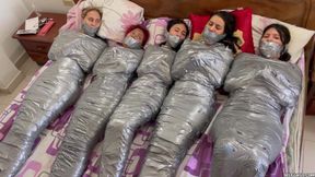 5 Mummified Girls Struggle All Wrapped up and Gagged!