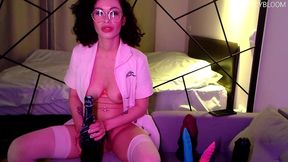 brunette with glasses rides a bottle and dildo and has an orgasm