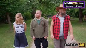 Blonde woman fellates his fat salami in nature