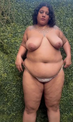 Clumsy girl gets help with her coral strap-on