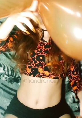 Feline Nails Having Fun with Balloons