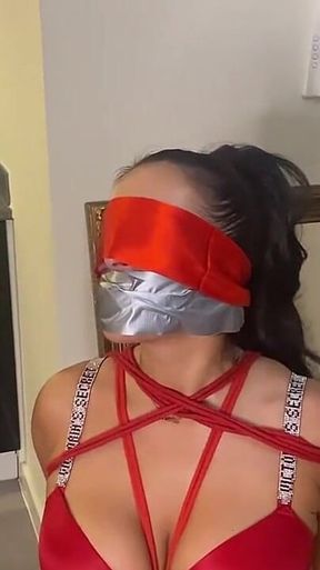 Latina Tied up and Gagged with a Tape Wrap (smaller Size)