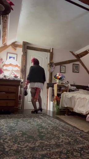 In an outfit with a short, slit skirt for an evening