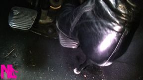 Pedal pumping in black leather boots