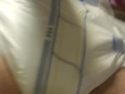 Wetting a new diaper