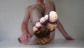 Feet in Fishnet Pantyhose: A Sensual Toe–Curling Experience